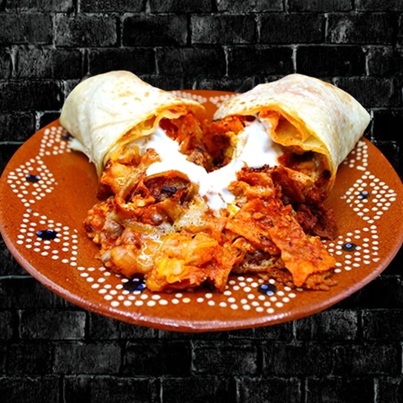 El Chilakil Breakfast Burritos at Rivas Mexican Grill