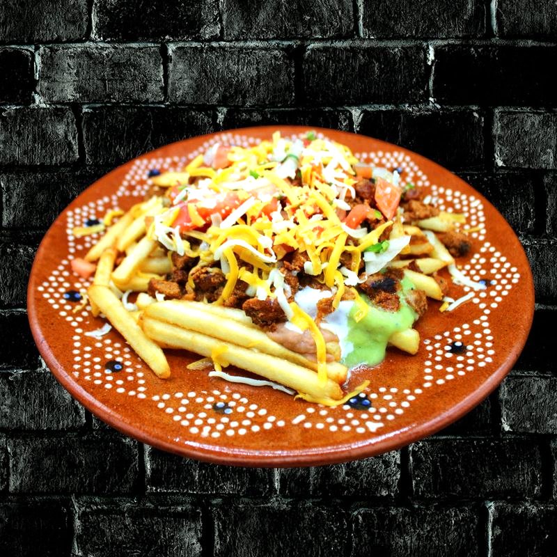 Pastor Loaded Frie at Rivas Mexican Grill